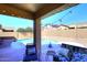 Backyard view of the pool and patio area, perfect for outdoor enjoyment at 10916 E Cholla Rd, Mesa, AZ 85207