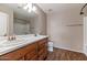 Bathroom with double sinks and a shower-tub combination at 10938 W Pierson St, Phoenix, AZ 85037