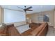 Spacious living room with a large white screen, perfect for entertainment at 10938 W Pierson St, Phoenix, AZ 85037