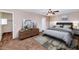 Cozy main bedroom with stylish furnishings, neutral tones, and ample natural light at 10938 W Pierson St, Phoenix, AZ 85037
