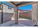 Covered patio with brick pavers offering space for outdoor relaxation and entertainment at 10938 W Pierson St, Phoenix, AZ 85037