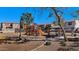 Community playground featuring slides, swings, and picnic area for Gathering fun at 10938 W Pierson St, Phoenix, AZ 85037