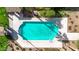 Aerial view of the large swimming pool and surrounding patio at 1150 E Liberty Shores Dr, Gilbert, AZ 85234