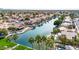 Aerial of lakefront community with lush landscaping and private boat docks at 1150 E Liberty Shores Dr, Gilbert, AZ 85234