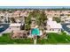 Aerial view of community pool area with seating cabanas, landscaping, and pool access at 1150 E Liberty Shores Dr, Gilbert, AZ 85234