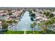 Beautiful lakefront community offers docks, fountains, and mature palm trees at 1150 E Liberty Shores Dr, Gilbert, AZ 85234