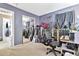 This flex space showcases guitars, mirrored closet and storage space at 1150 E Liberty Shores Dr, Gilbert, AZ 85234