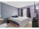 This bedroom features neutral colored walls and natural light at 1150 E Liberty Shores Dr, Gilbert, AZ 85234