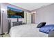 Cozy bedroom with a large screen TV, providing entertainment and comfort at 1150 E Liberty Shores Dr, Gilbert, AZ 85234