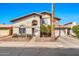 Charming two-story home with desert landscaping, a tile roof, and an attached two-car garage at 1150 E Liberty Shores Dr, Gilbert, AZ 85234