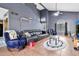 Spacious living room featuring tile floors, high ceilings, and a comfortable seating area at 1150 E Liberty Shores Dr, Gilbert, AZ 85234