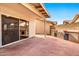Stamped concrete patio area with built in BBQ and convenient access through sliding glass doors at 1150 E Liberty Shores Dr, Gilbert, AZ 85234