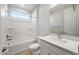 Clean bathroom featuring a bathtub, toilet, and vanity sink at 13538 W Calle De Baca --, Peoria, AZ 85383