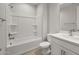 Bright bathroom featuring a bathtub, toilet, and vanity sink at 13538 W Calle De Baca --, Peoria, AZ 85383