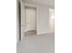 Bedroom with neutral carpet and doorway to bathroom at 13538 W Calle De Baca --, Peoria, AZ 85383