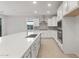Modern kitchen with stainless steel appliances and white cabinets at 13538 W Calle De Baca --, Peoria, AZ 85383
