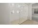 Modern shower with glass enclosure, white tile, and built-in bench at 13538 W Calle De Baca --, Peoria, AZ 85383