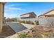 Backyard with a block wall surrounding the patio, offering privacy and tranquility at 1358 E Angie St, Casa Grande, AZ 85122