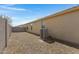 Backyard featuring low-maintenance landscaping, perfect for enjoying the outdoors with ease at 1358 E Angie St, Casa Grande, AZ 85122
