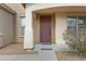 Inviting front door with a modern design and well-maintained surroundings, creating a warm welcome at 1358 E Angie St, Casa Grande, AZ 85122