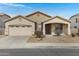 Charming one-story home featuring a two-car garage and low-maintenance landscaping at 1358 E Angie St, Casa Grande, AZ 85122