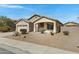 Charming single-story home with low-maintenance front yard and attached two-car garage at 1358 E Angie St, Casa Grande, AZ 85122