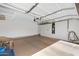 Spacious garage with overhead storage racks, providing ample space for vehicles and storage at 1358 E Angie St, Casa Grande, AZ 85122