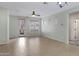 Spacious living area with a ceiling fan and natural light, adding comfort and ambiance to daily living at 1358 E Angie St, Casa Grande, AZ 85122