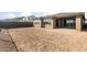 Awaiting your personal touch, the backyard offers an open canvas for outdoor design possibilities at 13769 W Whisper Rock Trl, Peoria, AZ 85383