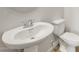 Powder room featuring a pedestal sink and toilet at 13769 W Whisper Rock Trl, Peoria, AZ 85383