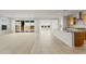 Open-concept living space with seamless transition to the kitchen and large windows at 13769 W Whisper Rock Trl, Peoria, AZ 85383