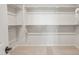 Spacious walk-in closet with multiple racks for organization and storage at 13769 W Whisper Rock Trl, Peoria, AZ 85383