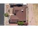 Overhead shot of home showcasing roof, landscaping, fenced yard, and surrounding neighborhood at 1435 Leisure World --, Mesa, AZ 85206