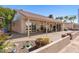 Spacious covered backyard patio with brick pavers, desert landscaping, and lovely views at 1435 Leisure World --, Mesa, AZ 85206