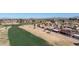 Scenic view of community adjacent to lush golf course with mountain views in the distance at 1435 Leisure World --, Mesa, AZ 85206