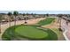 Picturesque golf course view surrounded by palm trees and well-maintained homes at 1435 Leisure World --, Mesa, AZ 85206