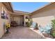 Inviting front courtyard featuring tile flooring and comfortable seating area at 1435 Leisure World --, Mesa, AZ 85206