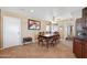 Spacious dining room with tile flooring, ceiling fan, and plenty of natural light at 1435 Leisure World --, Mesa, AZ 85206