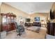 Spacious living room with high ceilings, tile floors and comfortable seating arrangement at 1435 Leisure World --, Mesa, AZ 85206