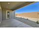 Covered patio offering an outdoor space, perfect for entertaining, with a view of the gravel backyard at 15032 W Gray Fox Trl, Surprise, AZ 85387