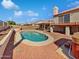 Landscaped backyard features a private swimming pool and outdoor spa at 15420 S 29Th St, Phoenix, AZ 85048