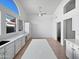 Large kitchen features an island with white countertop, white cabinets, and lots of sunlight at 15420 S 29Th St, Phoenix, AZ 85048