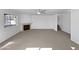Bright living room with views of the pool and fireplace, along with an open floor plan at 15420 S 29Th St, Phoenix, AZ 85048