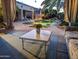 Beautiful backyard oasis with pool, spa, and covered patio space perfect for relaxing or entertaining at 15576 W Yucatan Dr, Surprise, AZ 85379