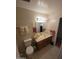 Bathroom with a toilet, vanity, mirror, and decorative sconce lighting at 1652 W Campbell Ave, Phoenix, AZ 85015