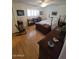 Bedroom with a decorative ceiling fan, dresser, and a bookshelf at 1652 W Campbell Ave, Phoenix, AZ 85015