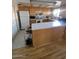 Spacious kitchen featuring wood cabinetry, white countertops, and modern appliances at 1652 W Campbell Ave, Phoenix, AZ 85015