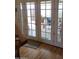 Charming patio door view that provides lots of natural light to the adjoining dining area at 1652 W Campbell Ave, Phoenix, AZ 85015