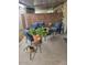 Outdoor patio with seating, brick wall, and potted plants providing a relaxing backyard retreat at 1652 W Campbell Ave, Phoenix, AZ 85015