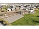 A community park features basketball courts, playgrounds, and shaded picnic areas amidst mature trees and well-maintained lawns at 20408 E Rosa Rd, Queen Creek, AZ 85142